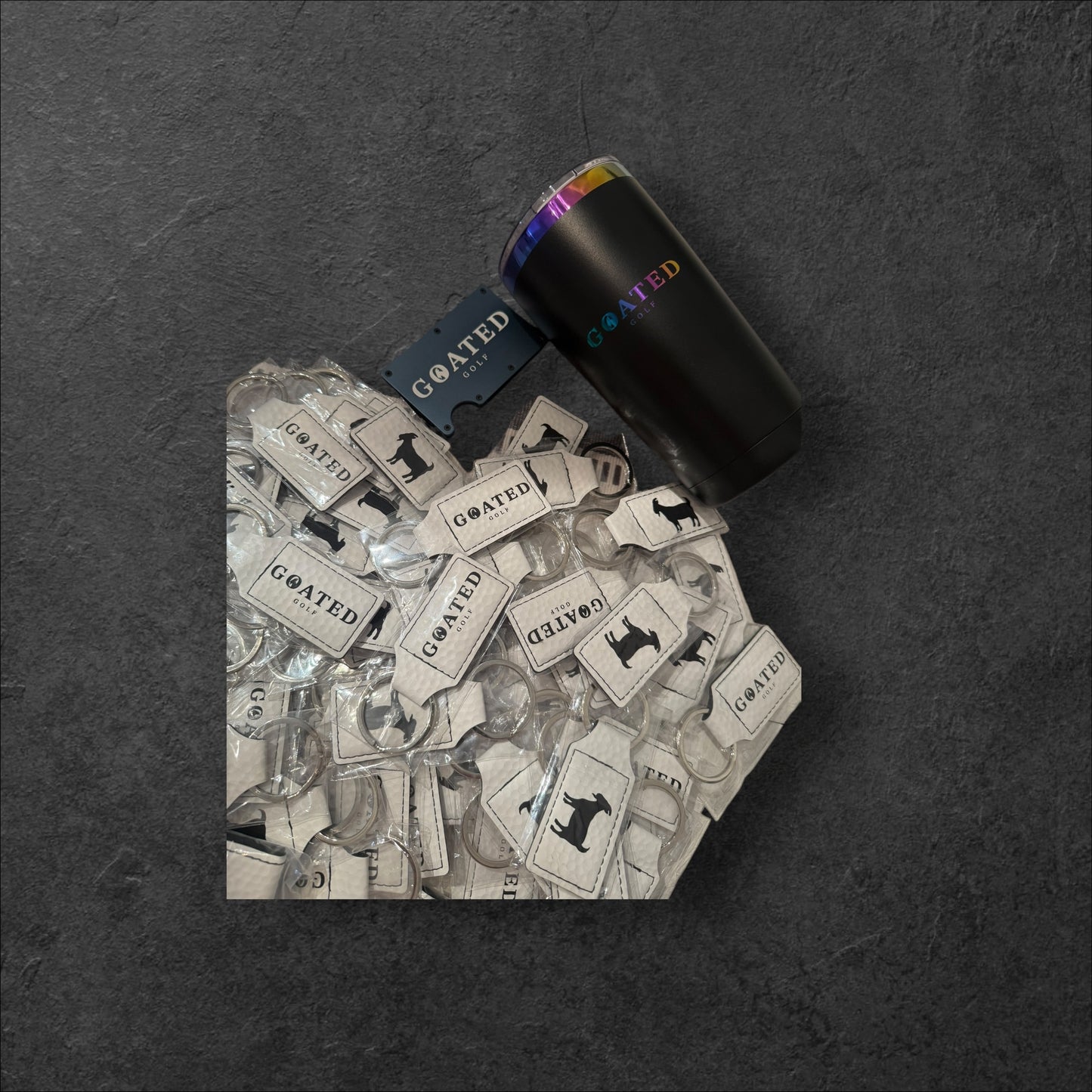 Golf ball pattern leatherette white keychains. Your designs done with no set up fees.